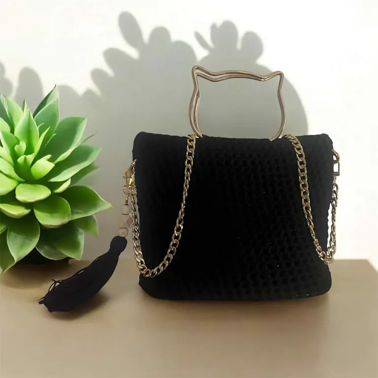 Sac à main noir avec poignée chat — photo 1 sur 2